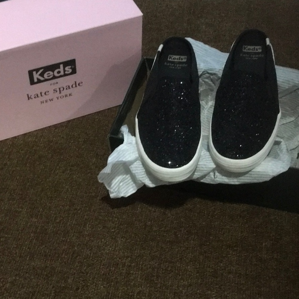 Meds Kate spade size 7. Black sparkle mules.